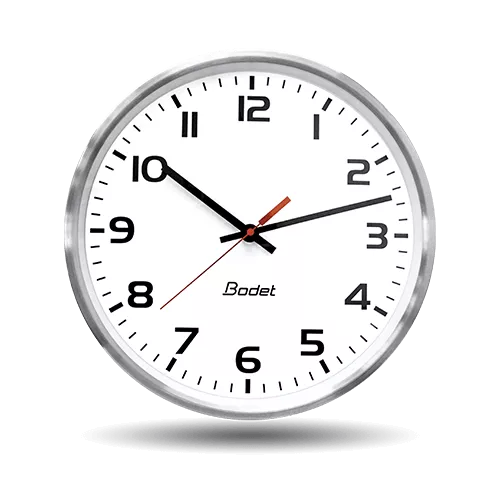 An indoor metallic analogue clock for the healthcare sector